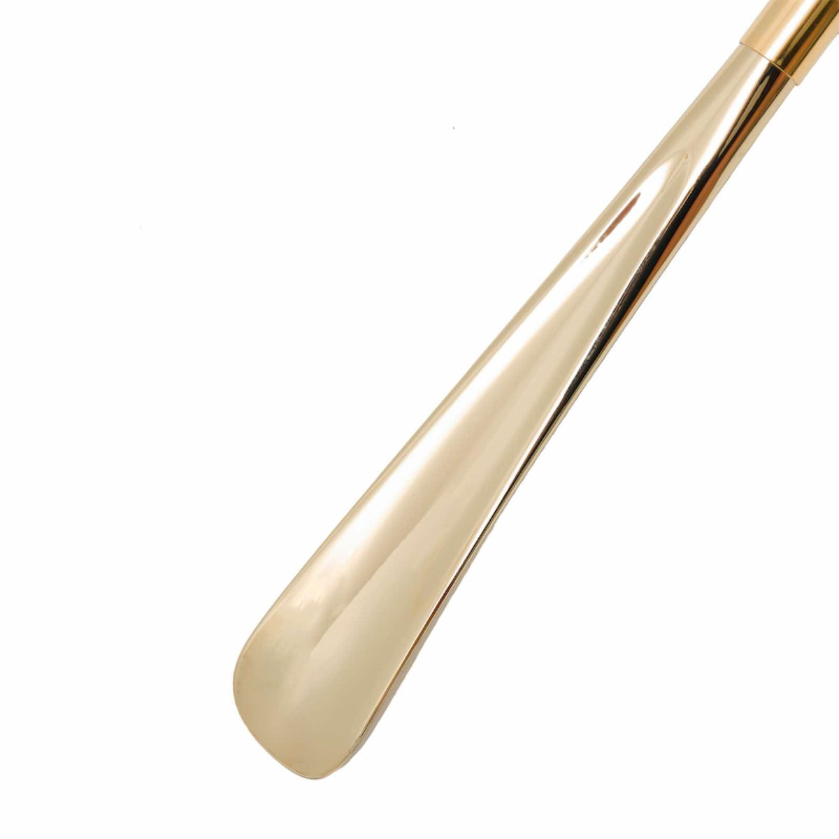 Glossy gold-tone shoehorn blade, close-up