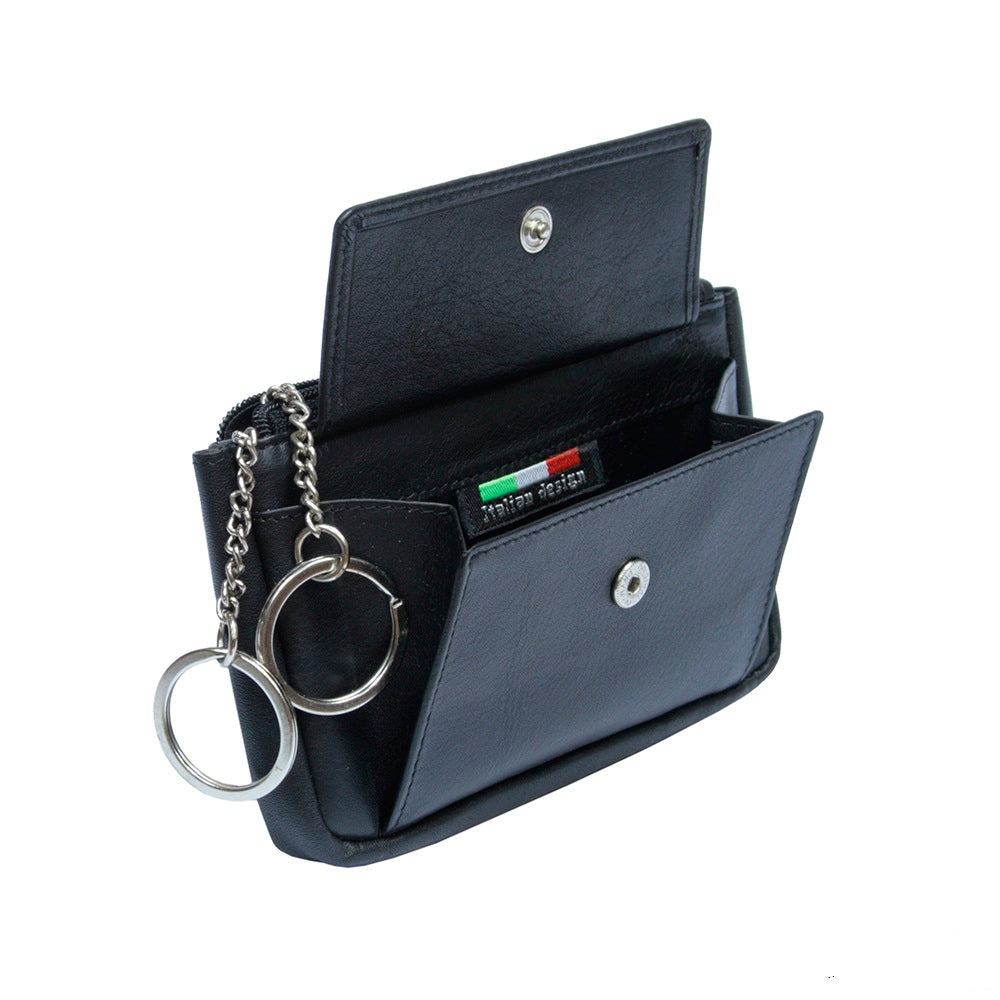 Tony Perotti Cortina 5060 nero — open: the snap-flap pocket unfastened, the woven «Italian design» label and the key rings on chains