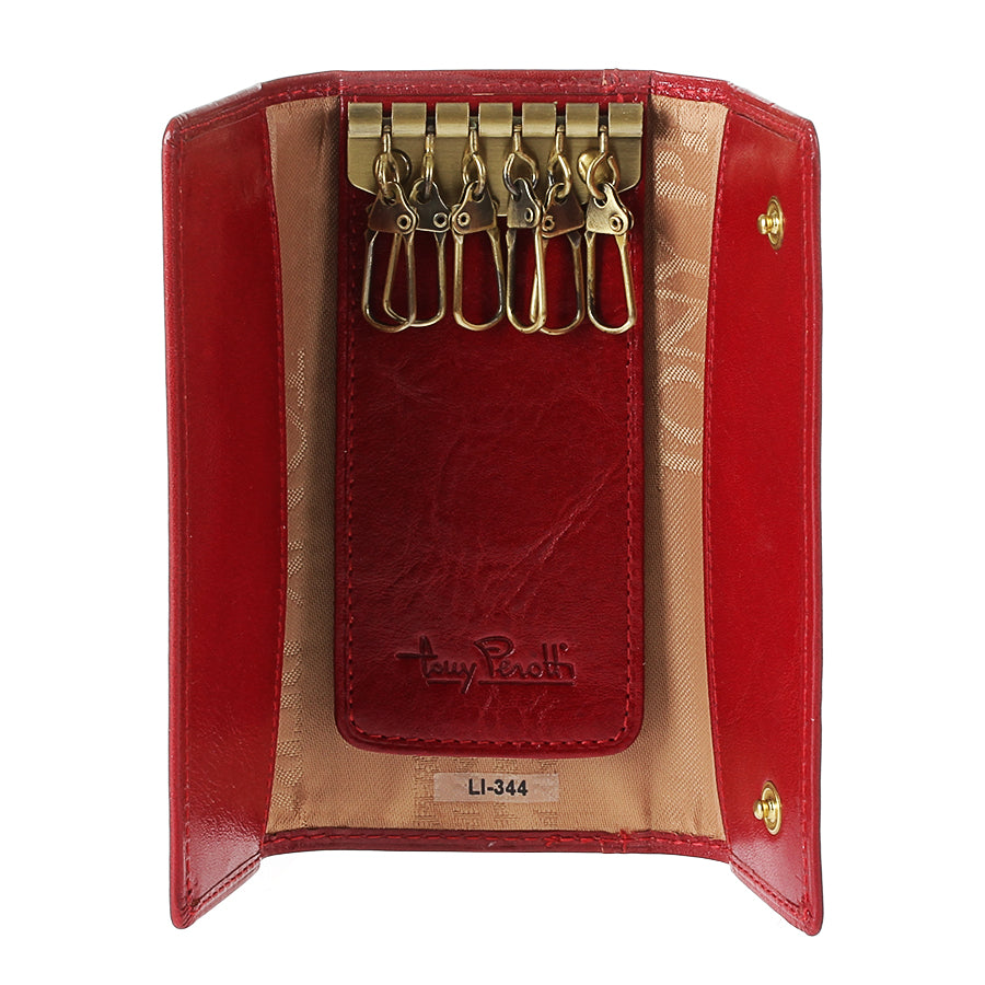 Red leather key case open with six brass swivel hooks and cream printed lining — Tony Perotti Italico 344 rosso