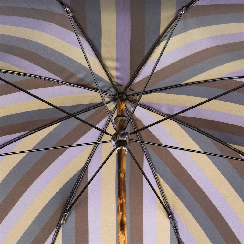 Underside of the open striped canopy with eight ribs and natural chestnut shaft