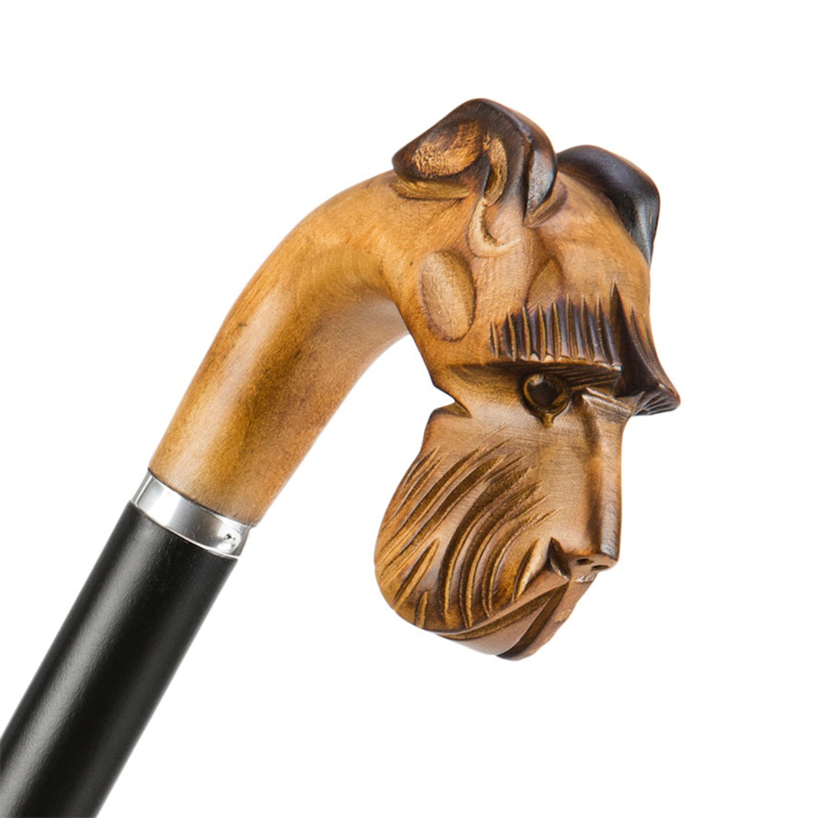 Hand-carved wooden schnauzer head handle with bearded muzzle and silver-tone ring, close-up, handcrafted in Italy