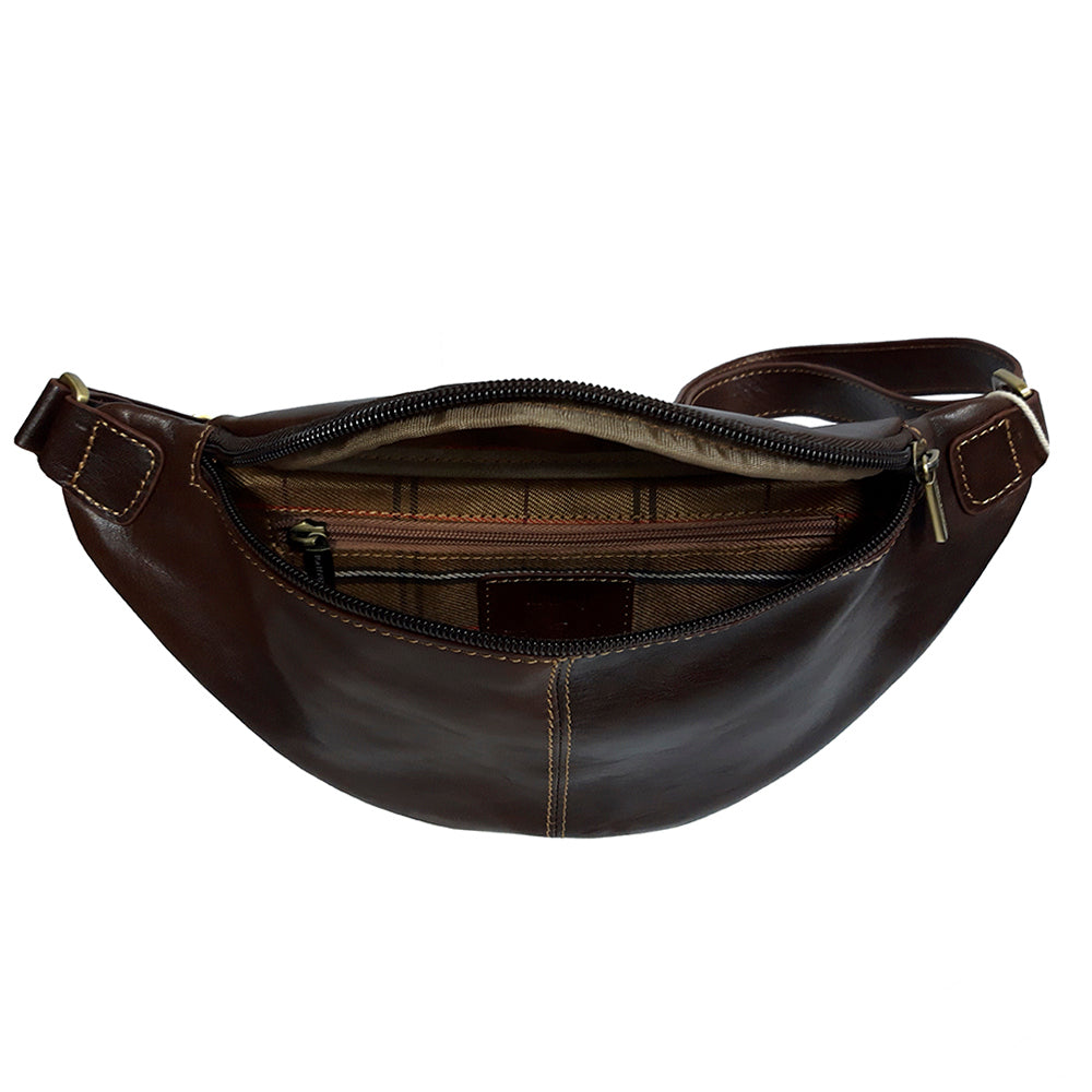 Inside the dark brown Tony Perotti Italico 6175 belt bag — branded checked lining, inner zip pocket and leather logo patch