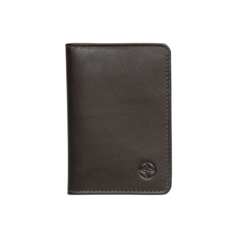 Tony Perotti Cortina 5004 moro — the brown leather business card holder closed, with the embossed compass rose on the front