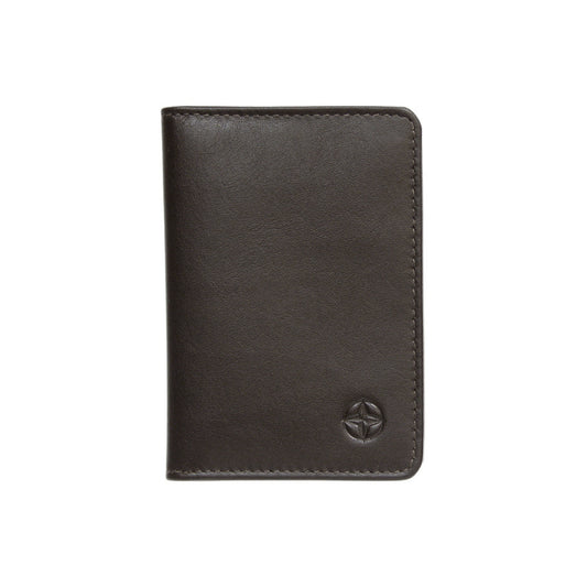 Tony Perotti Cortina 5004 moro — the brown leather business card holder closed, with the embossed compass rose on the front