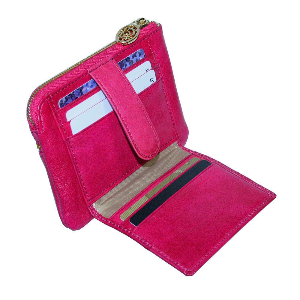 Tony Perotti Topkapi 3461 geranio — opened out, showing the card slots and the patterned lining