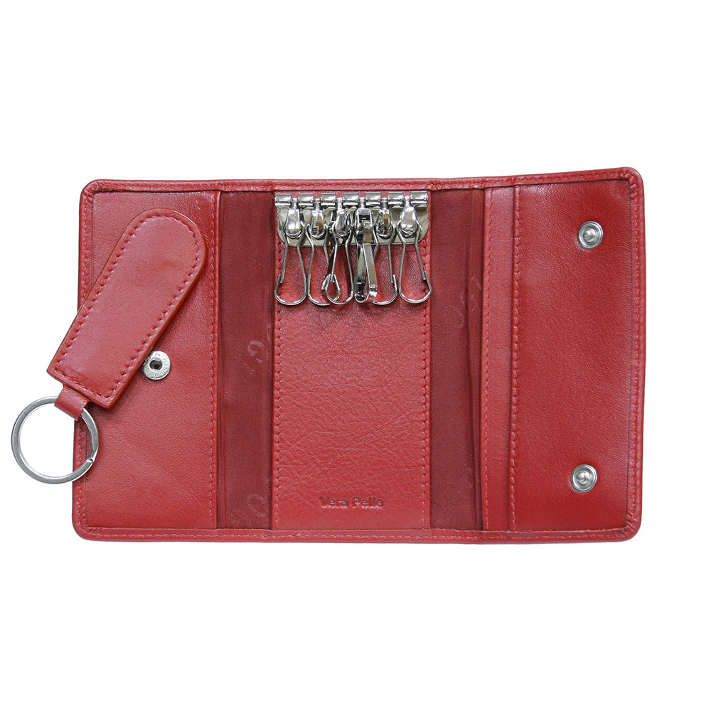 Red leather key case opened flat with six swivel hooks and the detachable fob — Cortina 5005 rosso