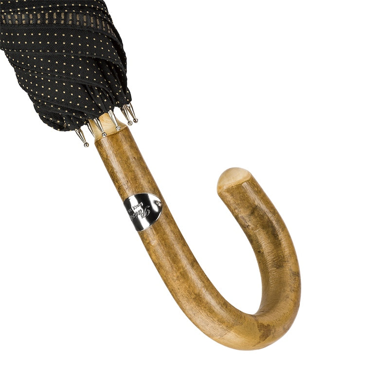 Ash crook handle with Pasotti plaque below the furled canopy