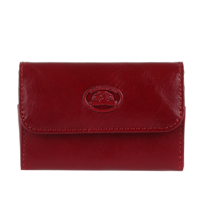 Tony Perotti Italico 2680 rosso — the red leather business card case closed, with the embossed turtle emblem on the lid