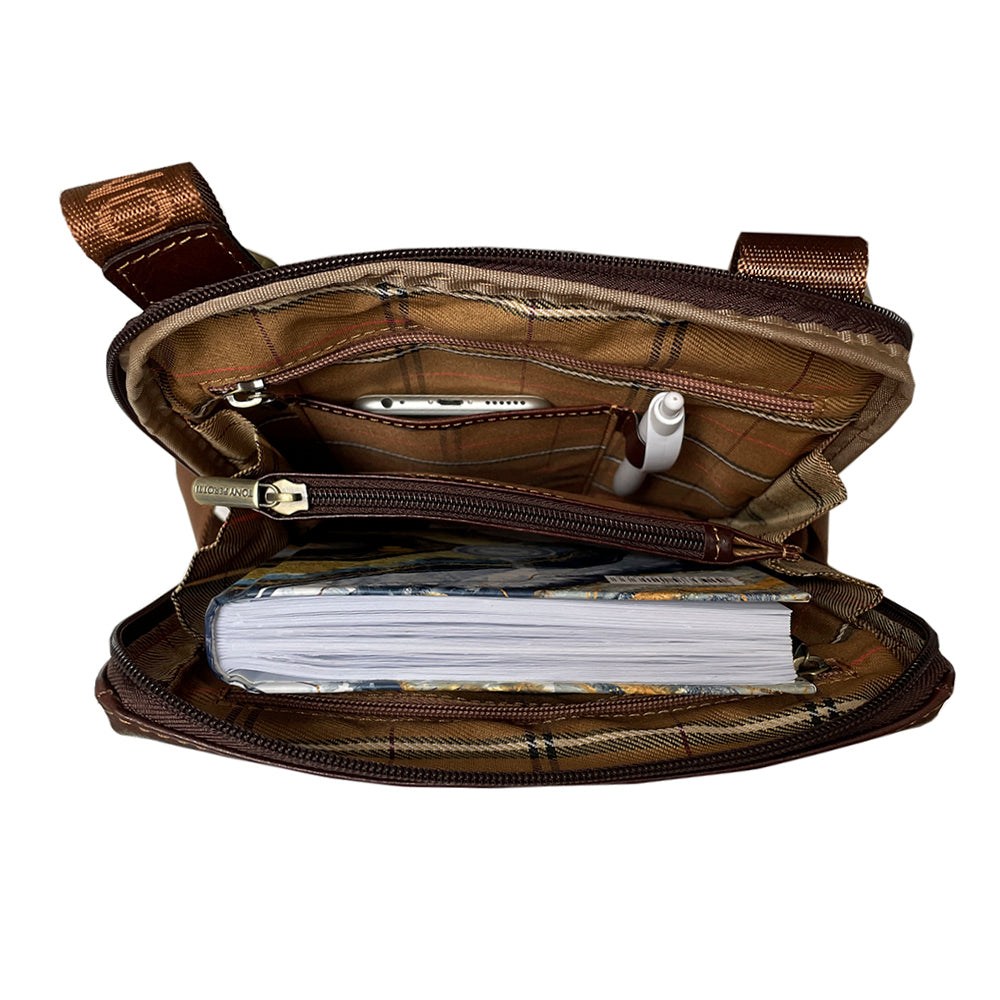 Dark brown Italico 9137-20 in use — phone in the open pocket, pen in the loop and a book in the main compartment
