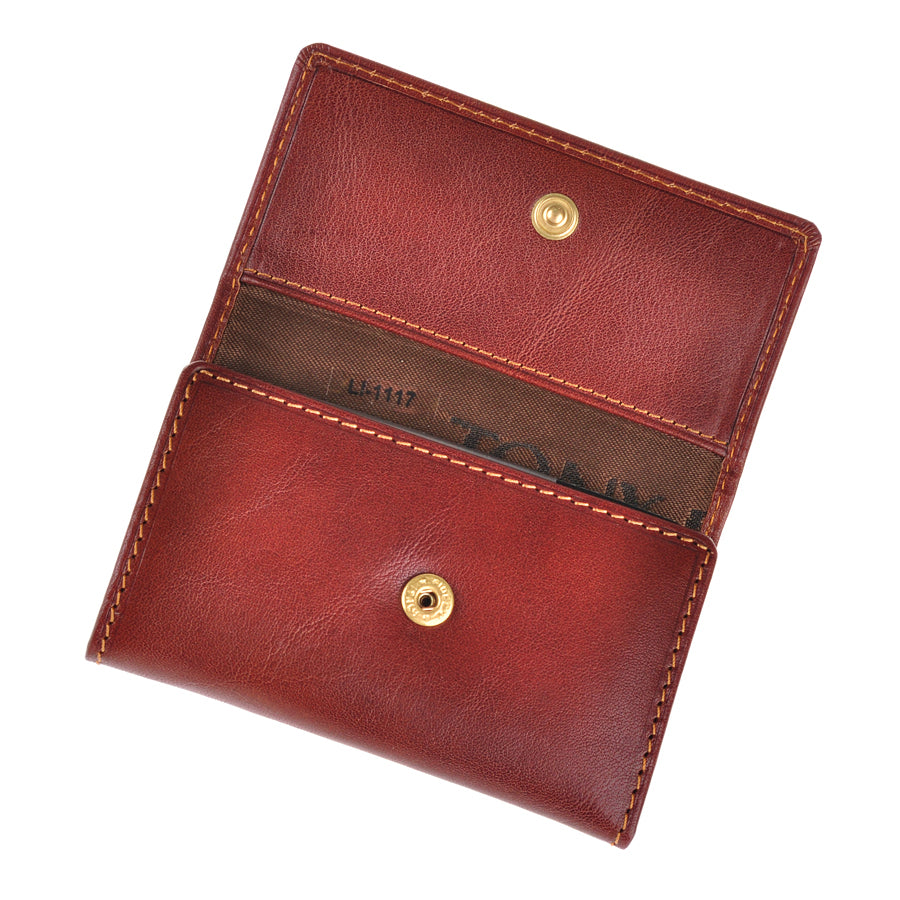 Cognac leather key case with the flap open showing the brass snap — Tony Perotti Italico 1117 cognac