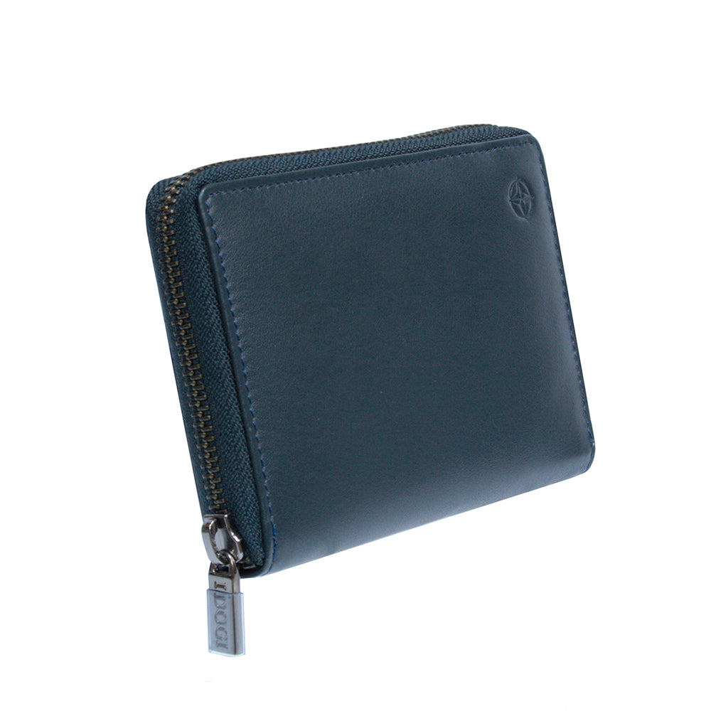 Navy Tony Perotti Cortina 5086 wallet closed at an angle — the zip running around the edge and the branded pull