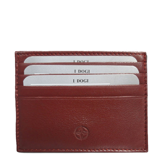 Tony Perotti Cortina 5043 rosso — front face of the red leather card holder with cards in the three slots and the embossed compass rose