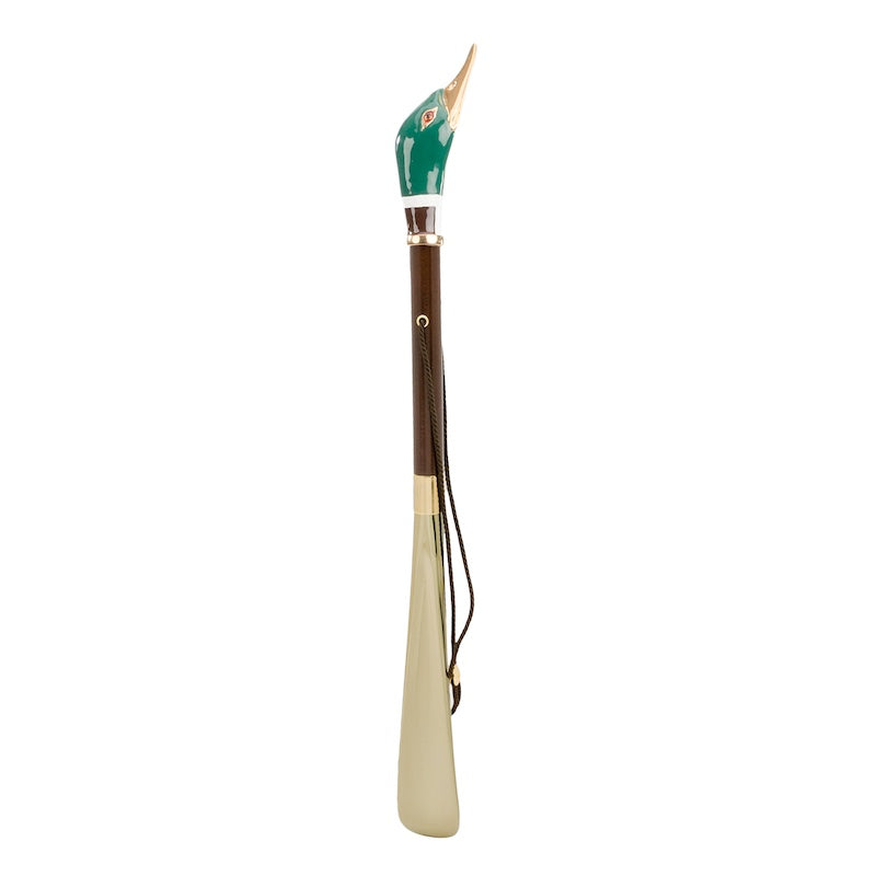 Mallard shoehorn standing upright: brown wooden shaft, hanging cord and gold-tone blade