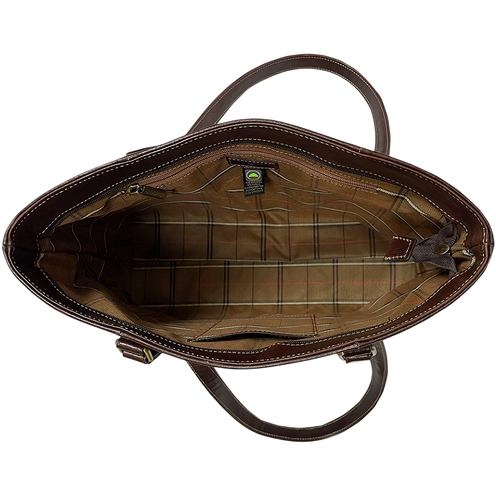 Inside the Tony Perotti Italico 8225 moro tote — woven check lining in olive and sand, zipped pocket along one wall and the stitched-in authenticity tag