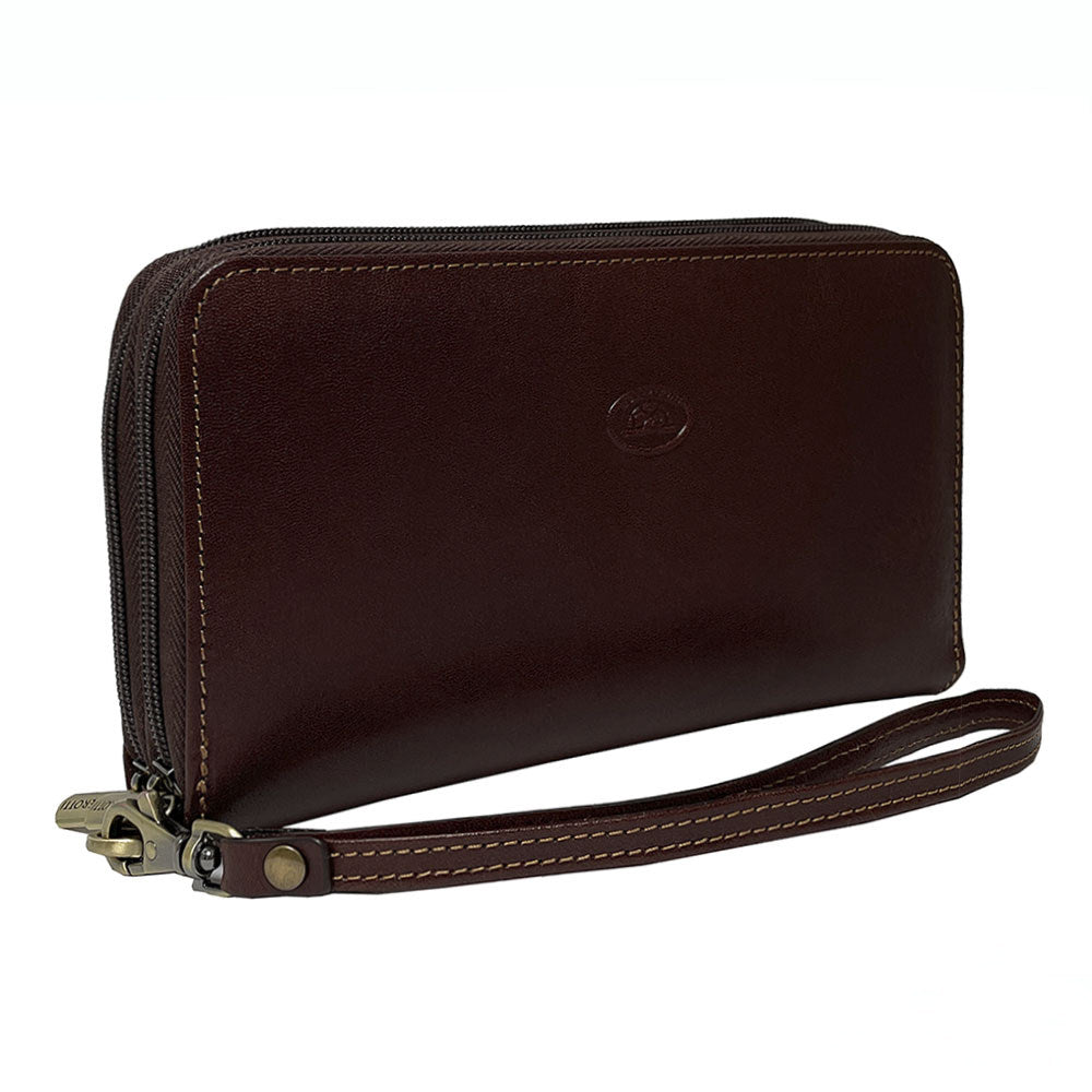 Tony Perotti Italico 3668 men's dark brown leather clutch — angled front view with two zip-around compartments, embossed turtle emblem and wrist strap