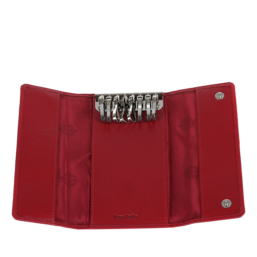 Tony Perotti Cortina 5022 rosso — opened flat: eight silver snap hooks on the metal bar, red «I DOGI» print side panels and «Vera Pelle» embossed on the centre panel