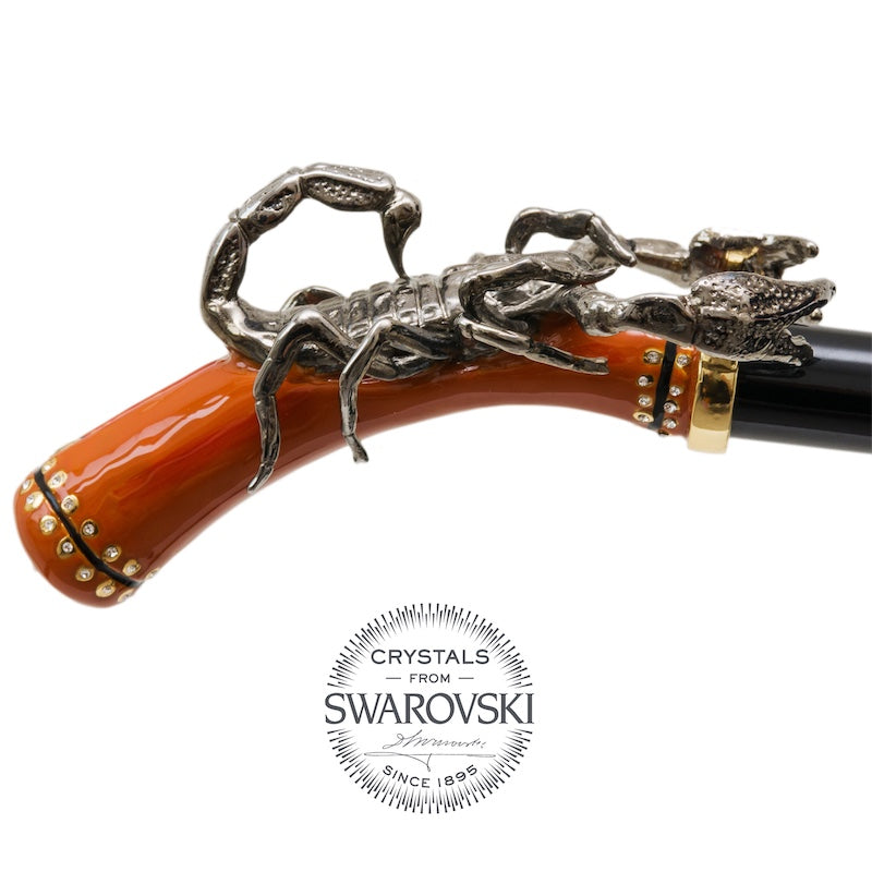 Ginger enameled handle with a dark silver-tone scorpion and bands of crystals, Crystals from Swarovski seal