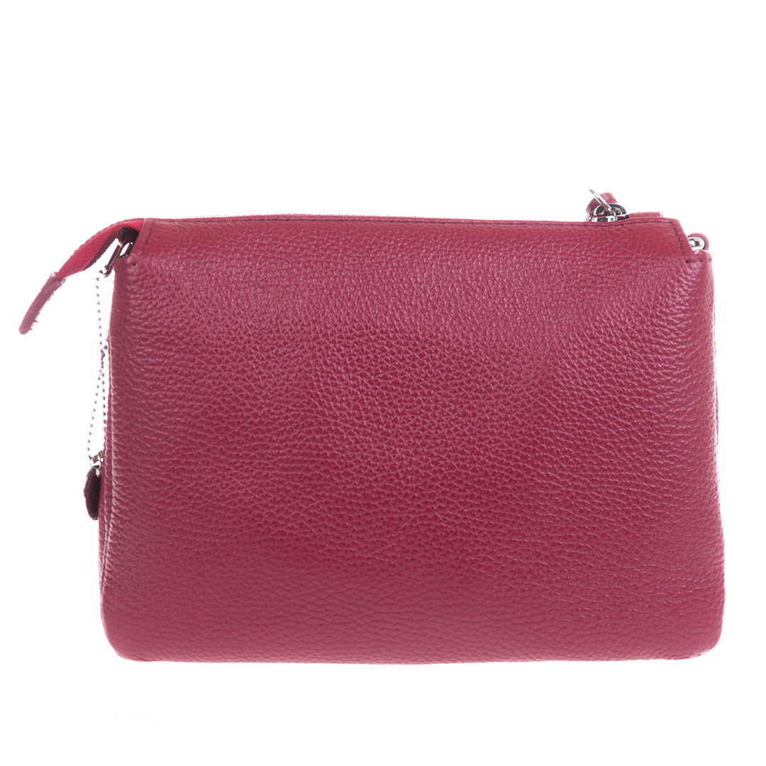 Back of the Tony Perotti Borsa CA04B-30DR red leather bag with the ball-chain zip pull hanging at the corner