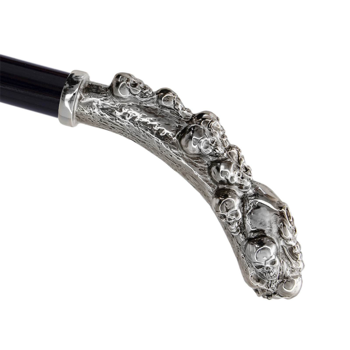 Curved brass handle covered with sculpted skulls above a silver-tone collar and glossy black grip