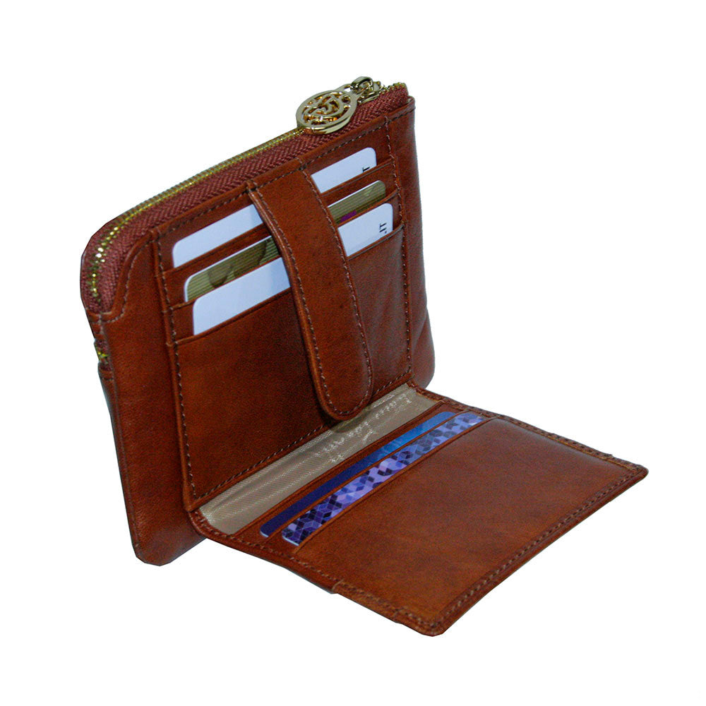 Tony Perotti Topkapi 3461 ambra — opened out, showing the card slots and the patterned lining