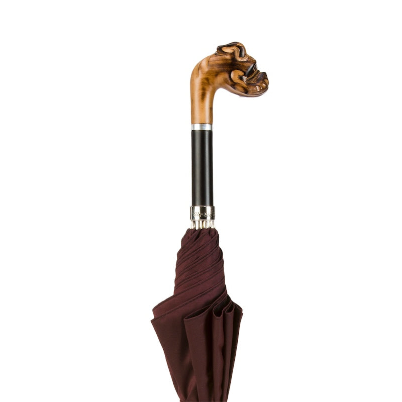 Bulldog handle, black grip section and silver-tone collar above the furled canopy