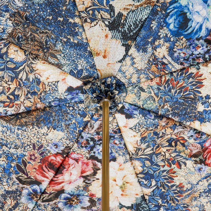 Inside of the canopy: roses and small flowers in blue, red and cream