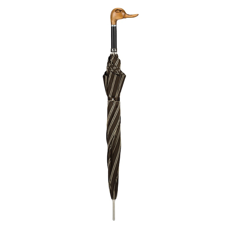 Closed brown striped umbrella standing upright with wooden duck head handle