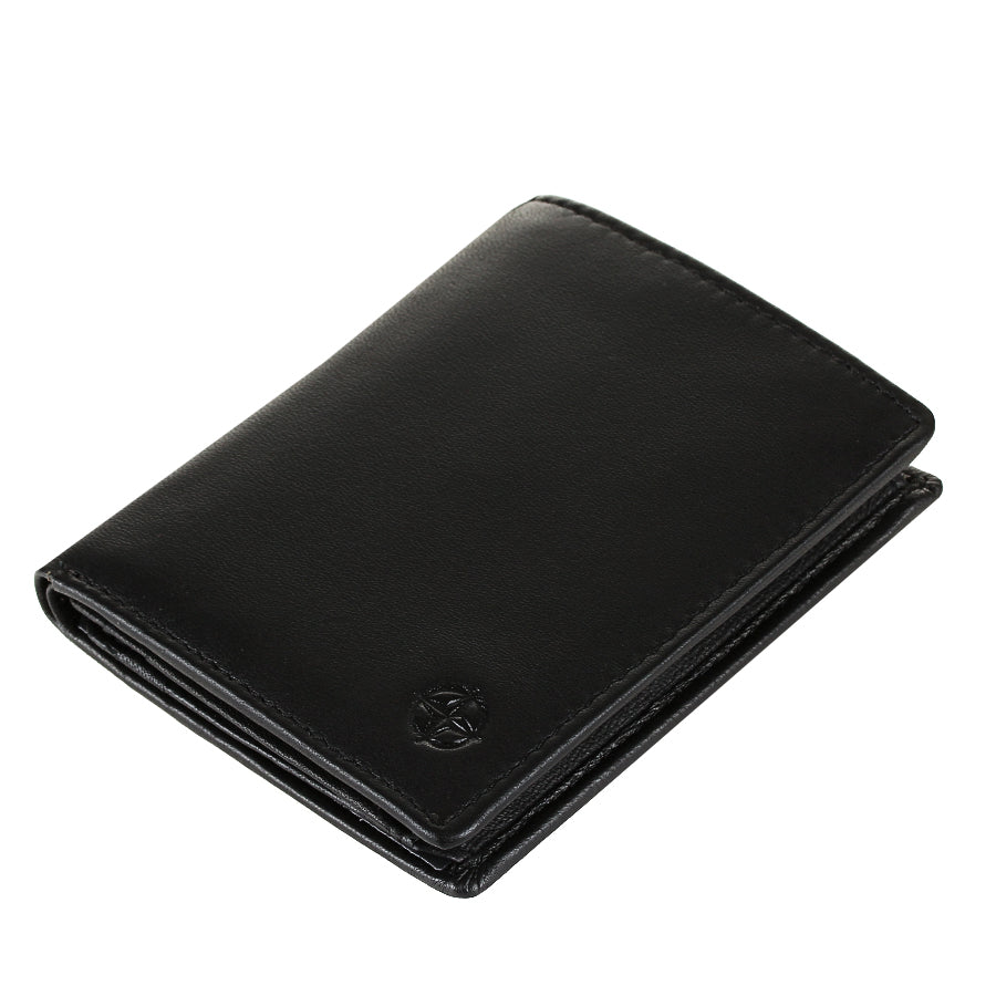 Black Tony Perotti Cortina 5088 nero card wallet lying tilted — the closed fold and the embossed compass rose