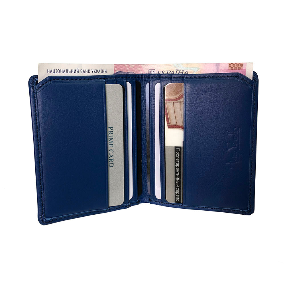 Tony Perotti New Rainbow 1034 bluette — opened out with cards in the slots on both halves and a banknote between them