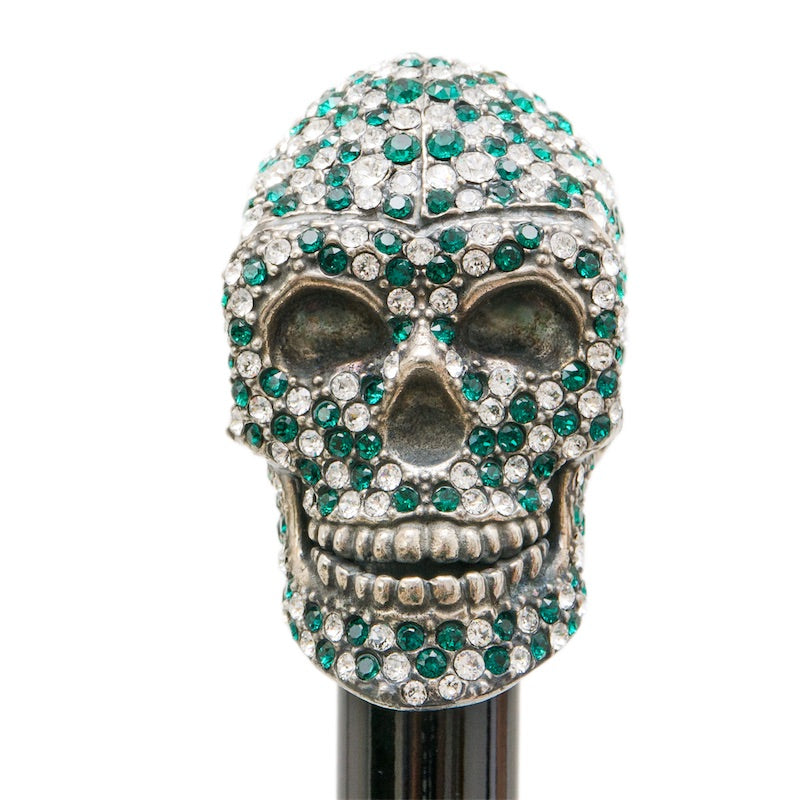Skull handle set with clear and emerald-green Swarovski crystals, front close-up, handcrafted in Italy
