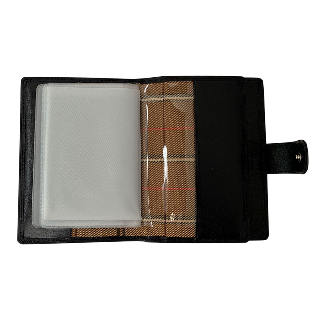 Tony Perotti Italico 1424A nero document holder opened with the sleeve booklet turned to the left, showing the full-height transparent pocket