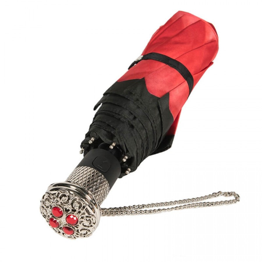 Red and black umbrella with decorative handle on a white background