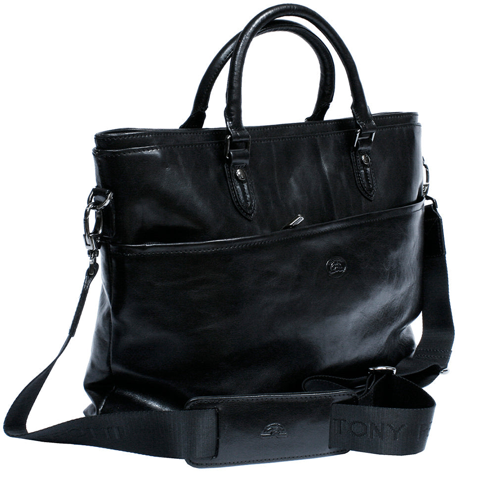 Tony Perotti Italico 7615 nero black leather laptop bag with the detachable shoulder strap attached — jacquard webbing woven with the Tony Perotti name, a leather shoulder pad and silver snap hooks