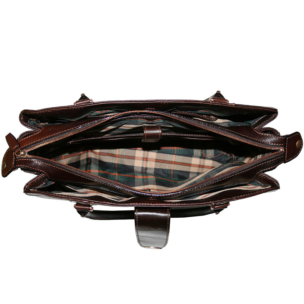 Interior of the Tony Perotti Italico 9715-40 moro laptop bag — the centre compartment unzipped, showing the checked lining and the leather divider between the compartments