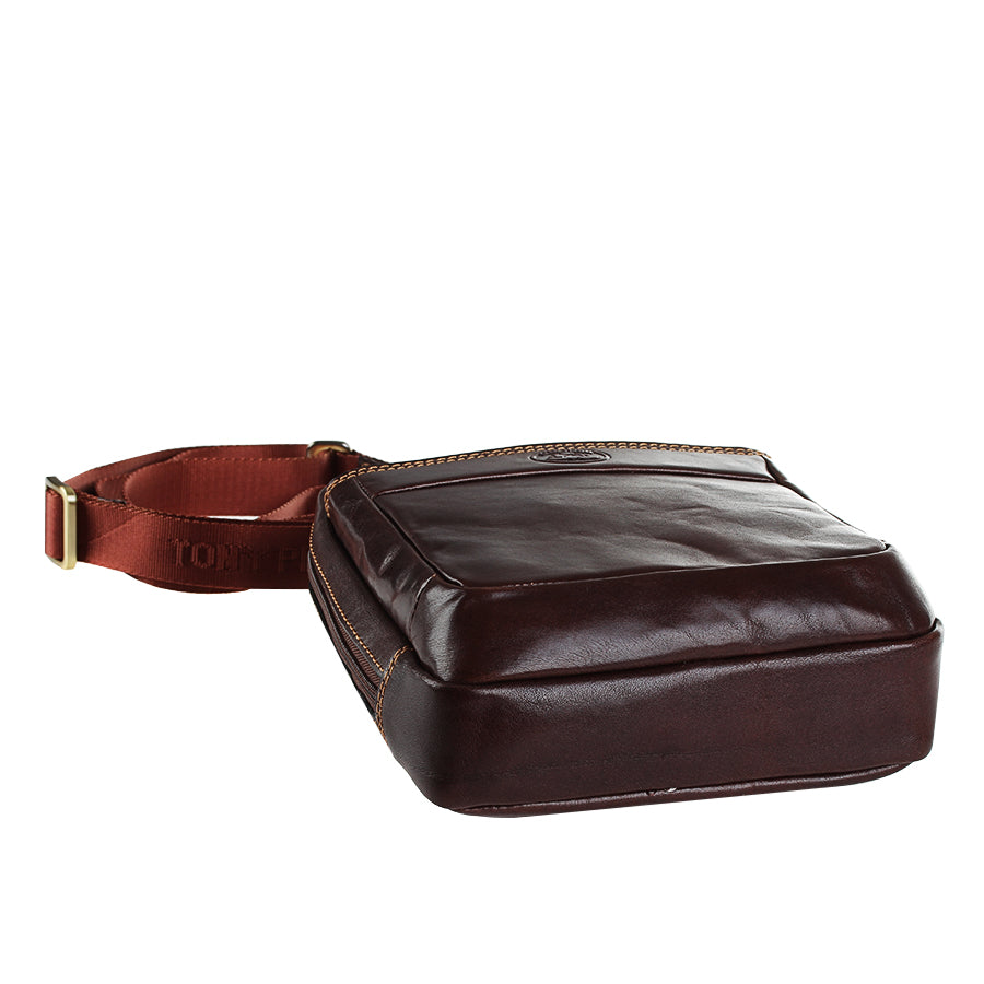 Dark brown Tony Perotti Italico 9984 lying flat — structured bottom and terracotta textile strap