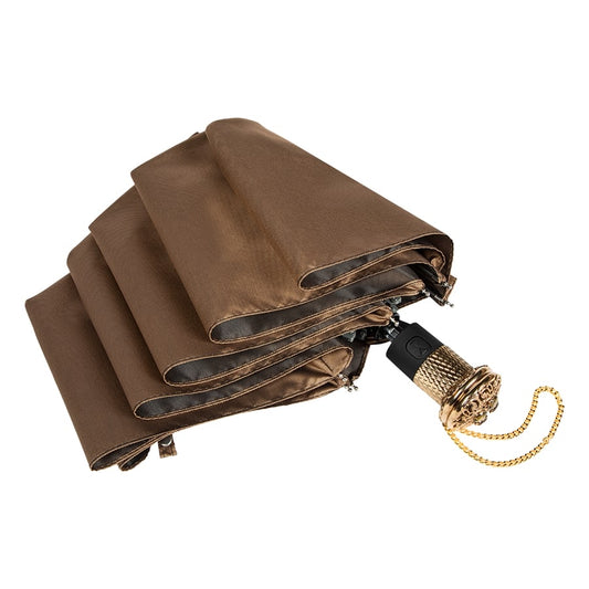 Folded beige umbrella with a gold handle on a white background