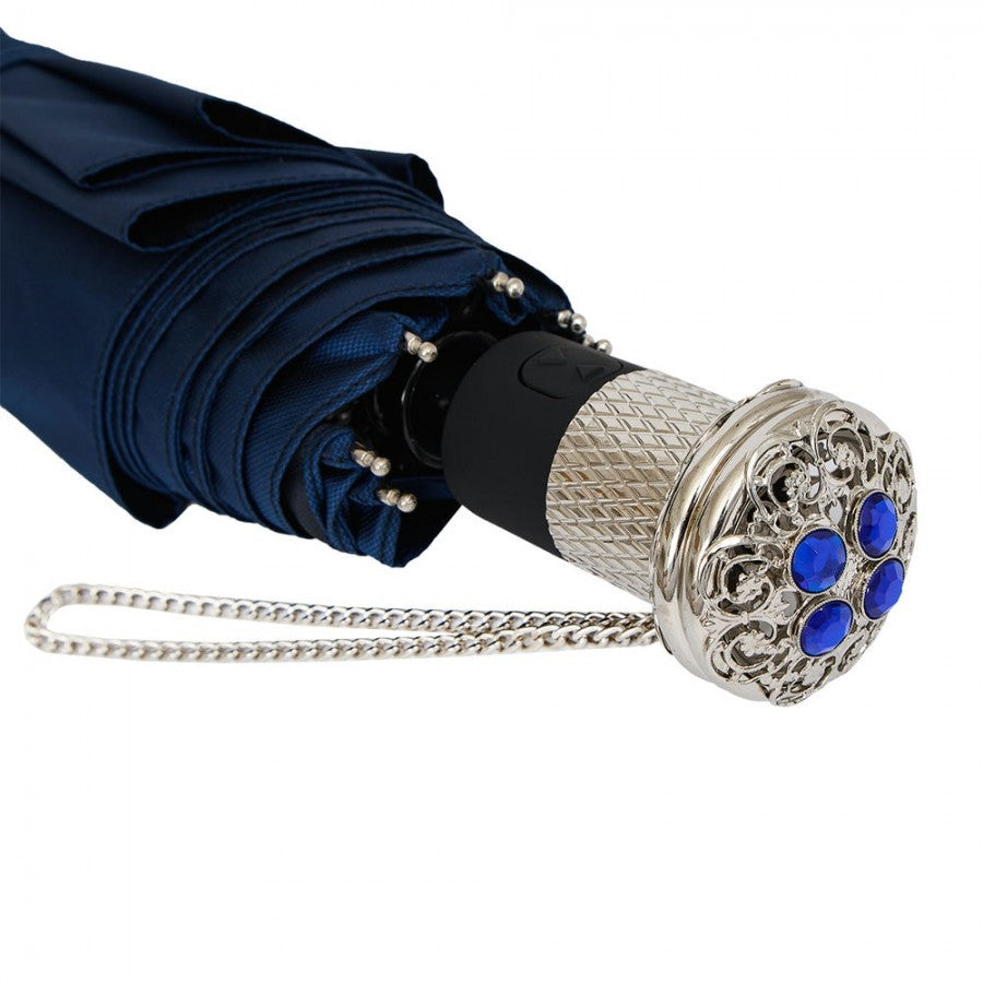 Silver-tone brass handle of Pasotti dark blue folding umbrella with blue crystals