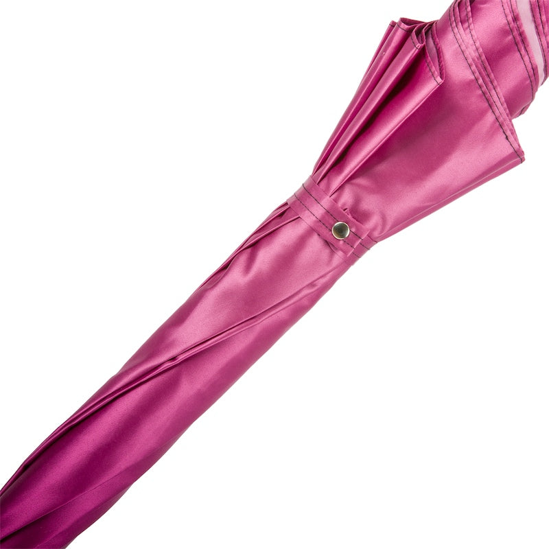 Closed Pasotti fuchsia umbrella with Swarovski skull handle