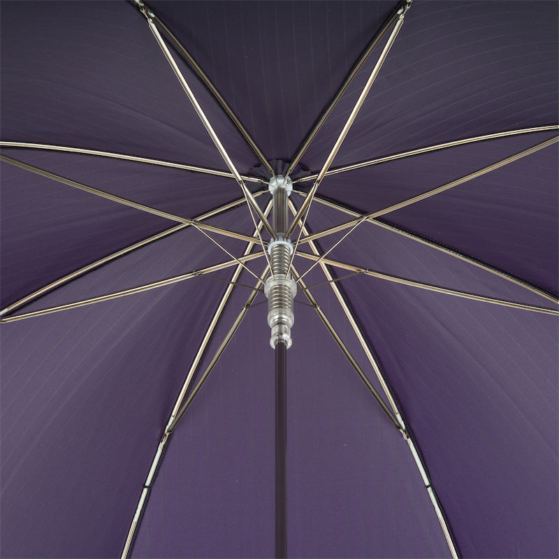 The canopy and spokes of the purple Pasotti umbrella