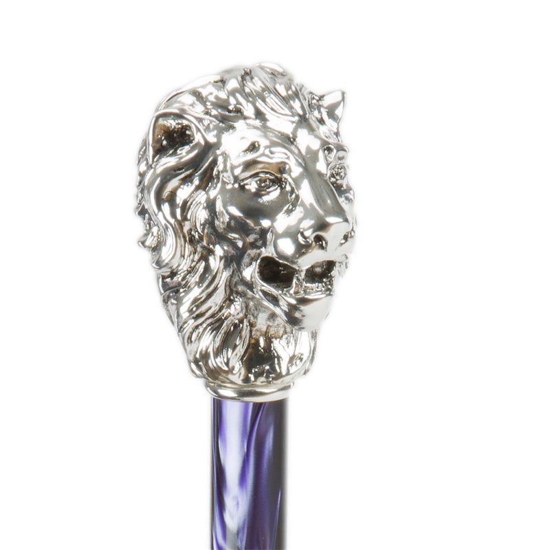 The silver lion is the handle of a purple Pasotti umbrella 2