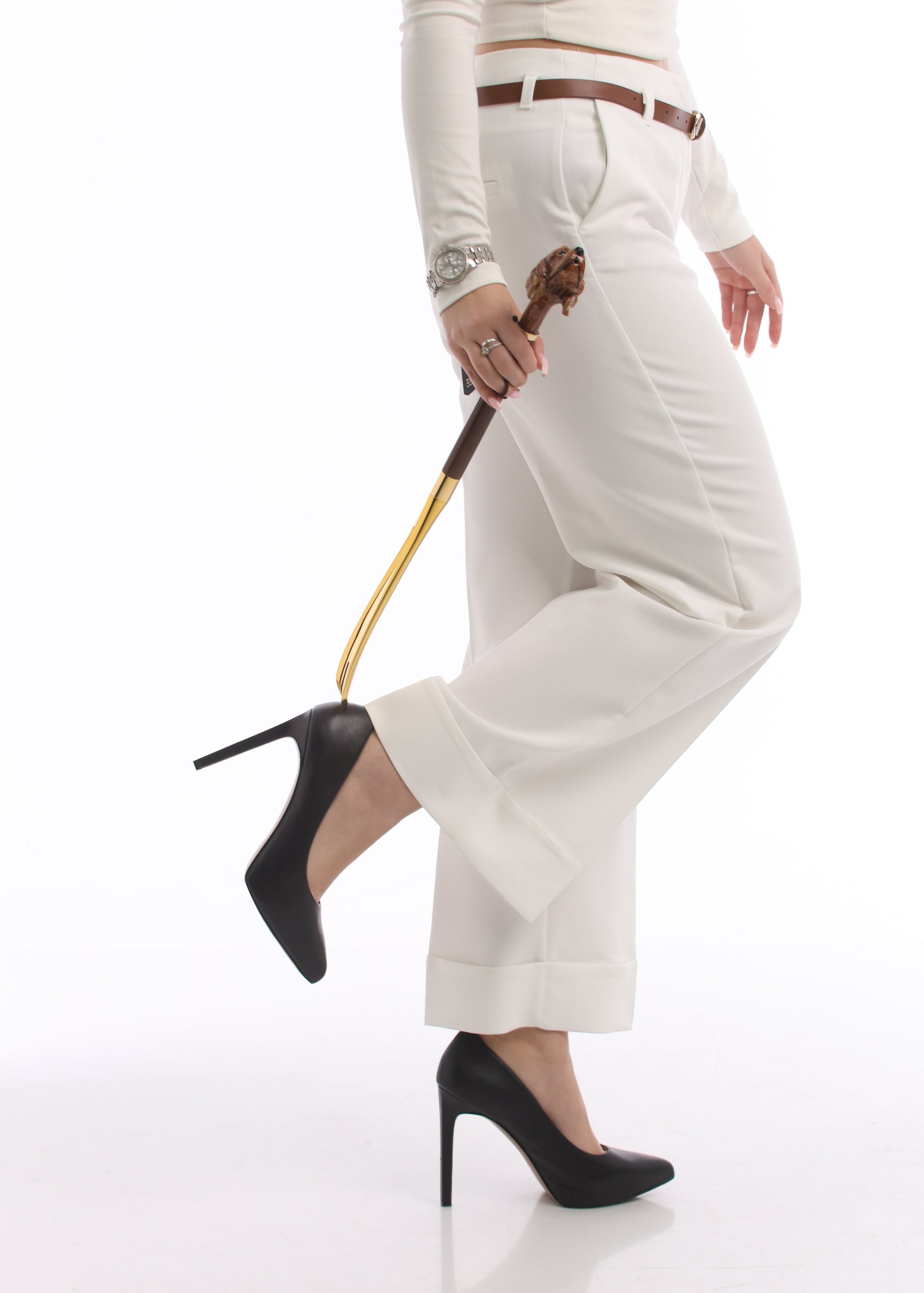 Lifestyle image of a model with the Pasotti designer shoeshorn