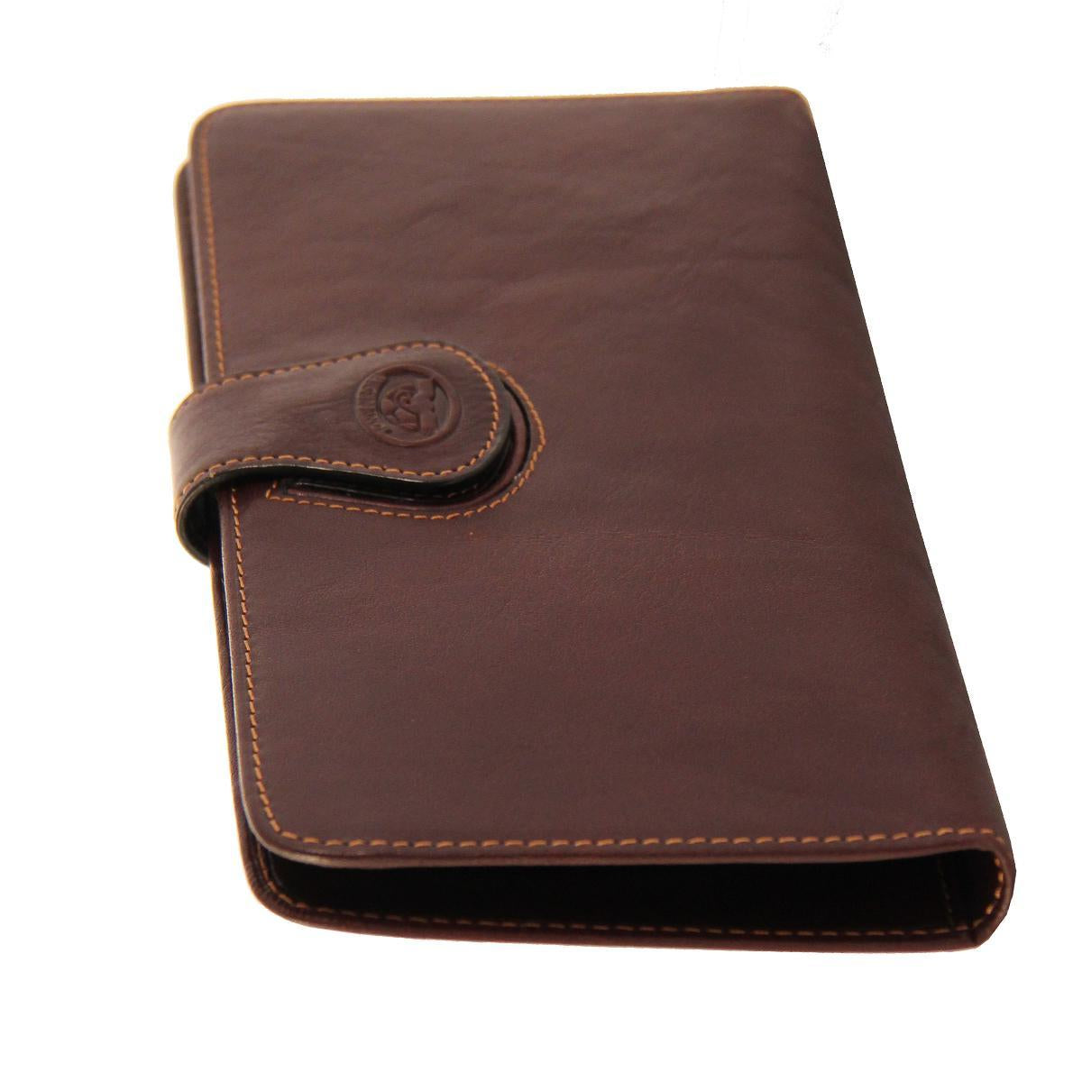 Tony Perotti brown leather travel wallet on a white background