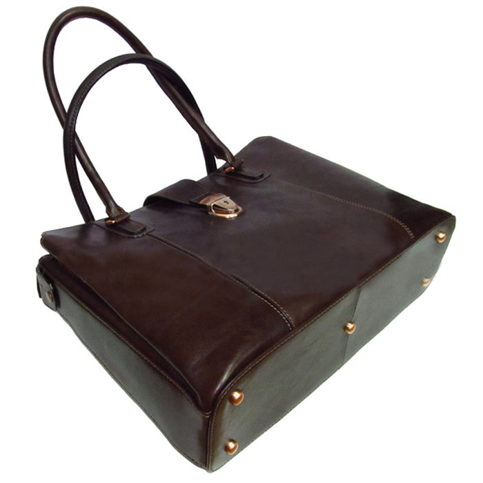 Tony Perotti Italico 9715-40 moro leather laptop bag tipped forward — bronze metal feet on the base and the lock on the front strap