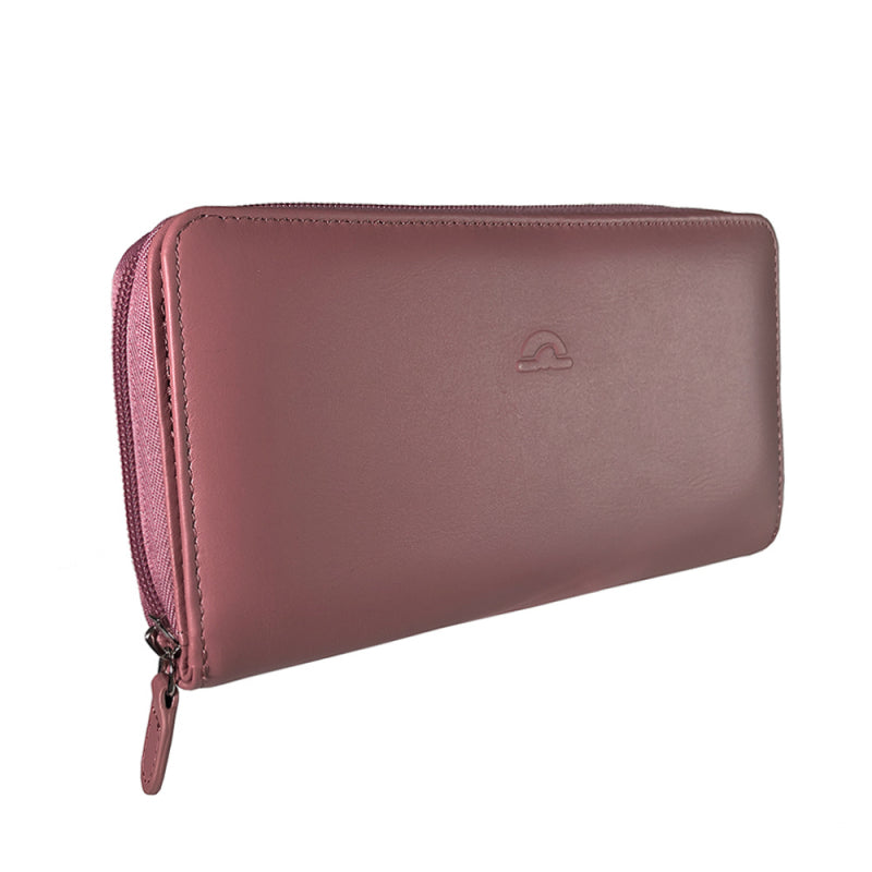 Tony Perotti New Rainbow 1192 rosa antico dusty pink leather zip-around wallet at an angle, closed — embossed oval Tony Perotti emblem
