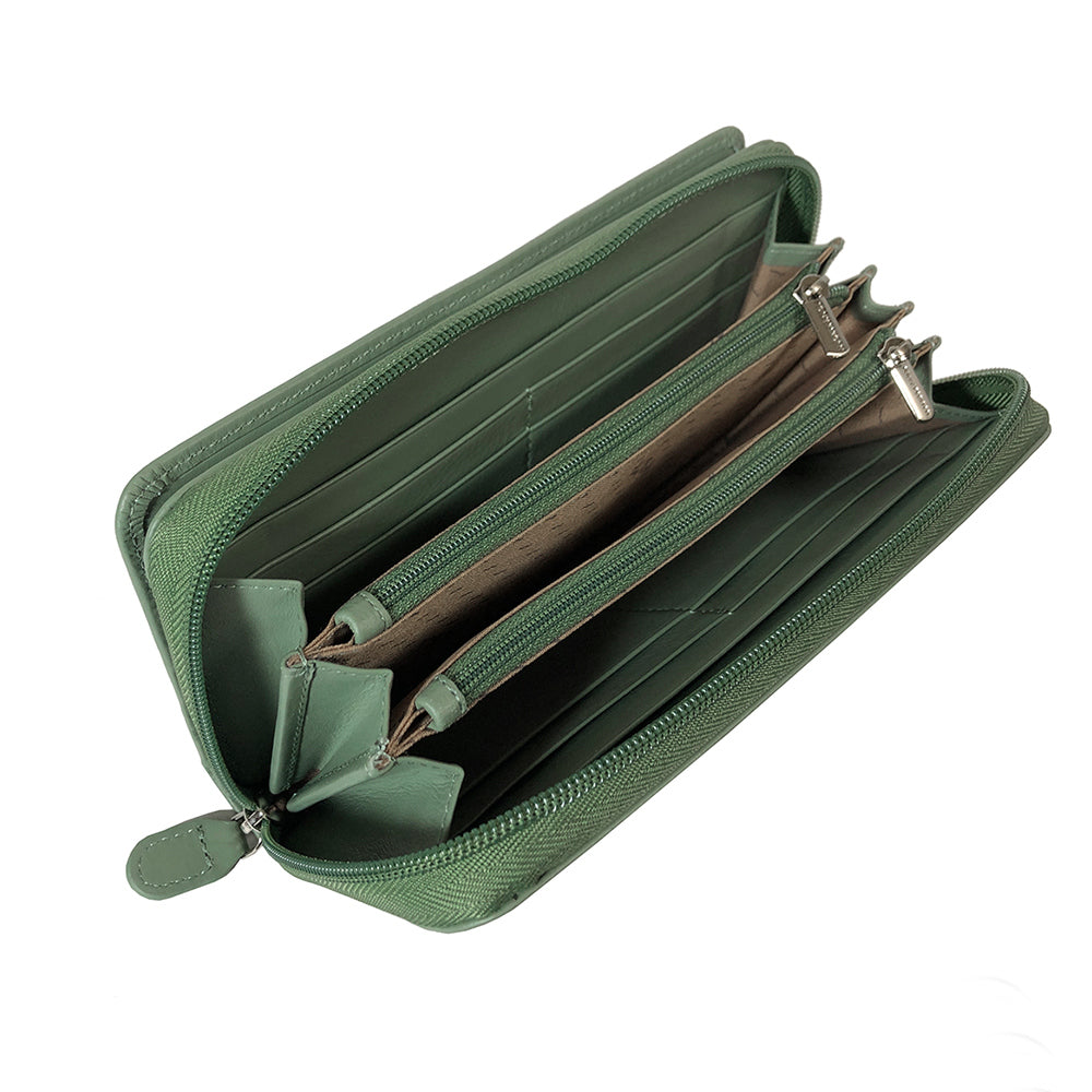 Tony Perotti women’s sage green leather zip-around wallet with multiple compartments and zippers on a white background