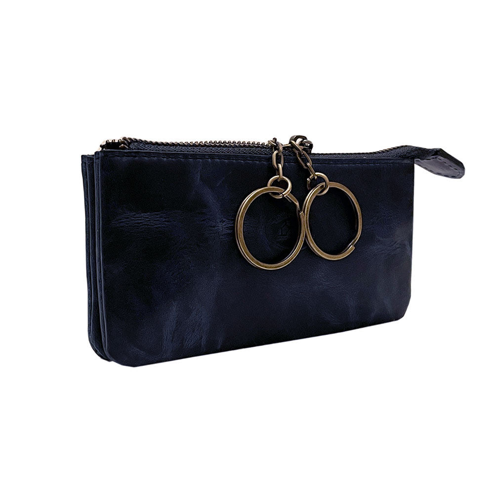 Blue Arno 3350 key case at an angle — flat zip pouch with the two key rings hanging from their brass chains
