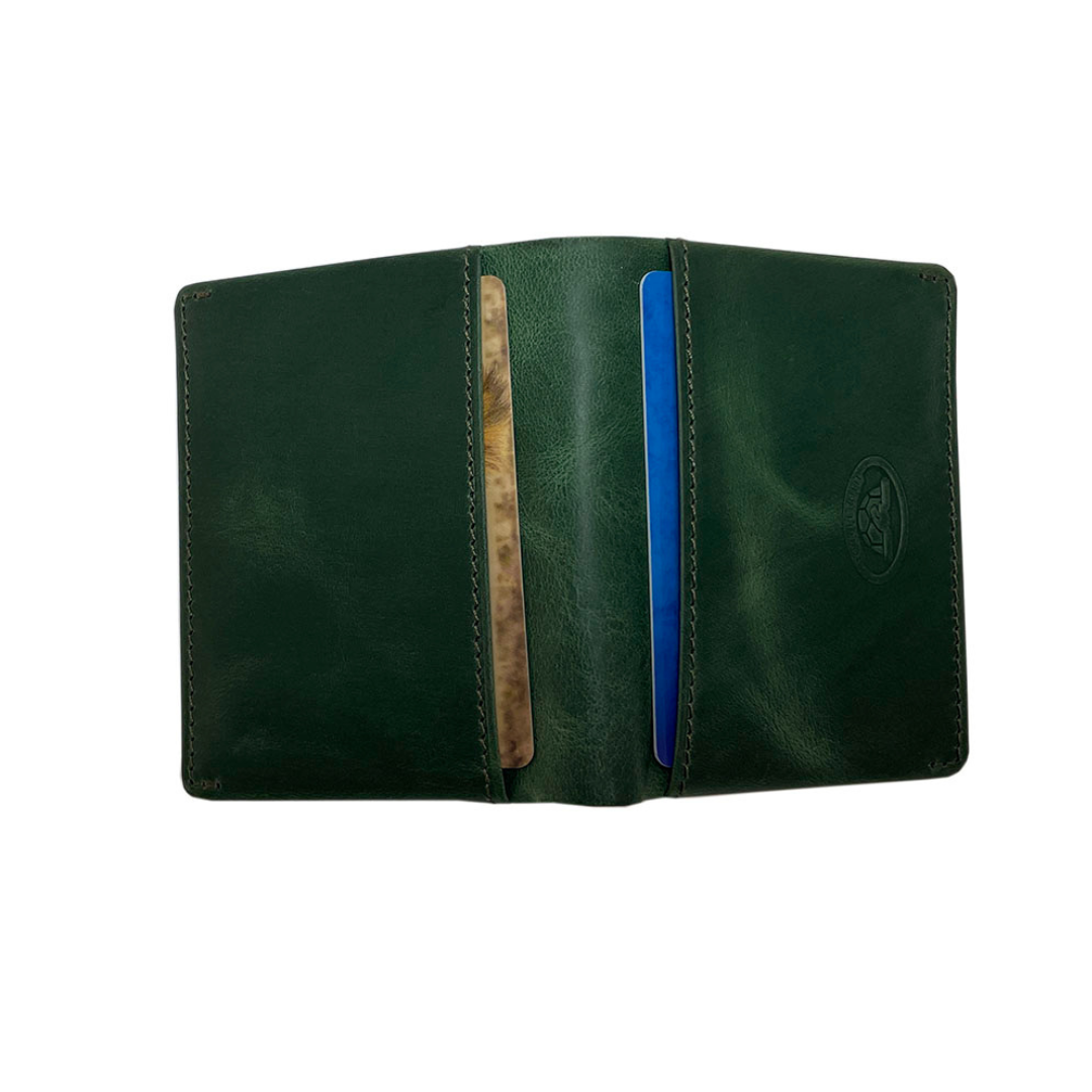 Tony Perotti Arno 1034N deep green leather card holder open, showing a card in each of the two central slim slots
