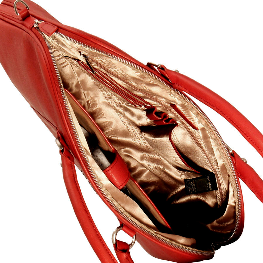 Interior of the Contatto 9574-40 rosso briefcase lined in champagne satin woven with the Tony Perotti name