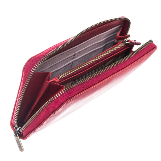 Tony Perotti red vintage-look leather wallet with a zipper on a white background