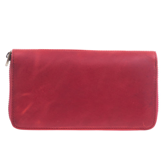 Tony Perotti red vintage-look leather zip-around wallet on a white background